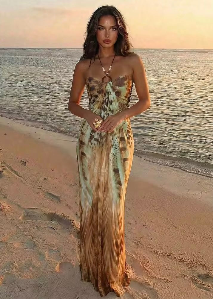 Calypso boho tropical print halter maxi dress styled on a beach