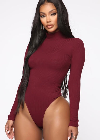 Burgundy ribbed high neck bodysuit with long sleeves and fitted silhouette.